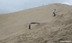 Humor -  Fun Sport Snowboard Auf dem Sand (Sandboarding) 
